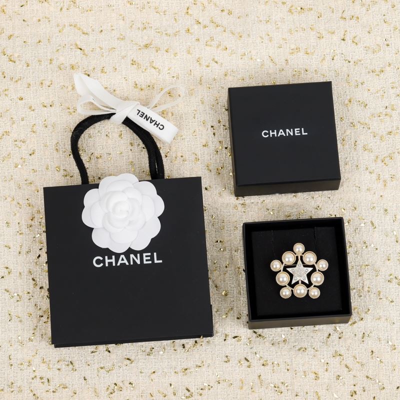 Ch*el brooches